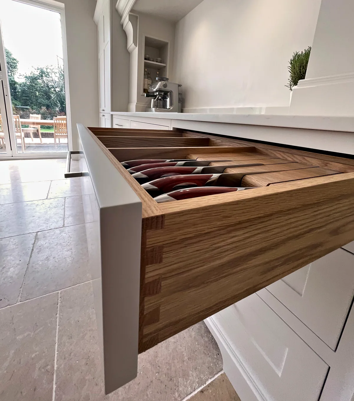 Oak knife drawer with hand cut dovetail joints pulled open