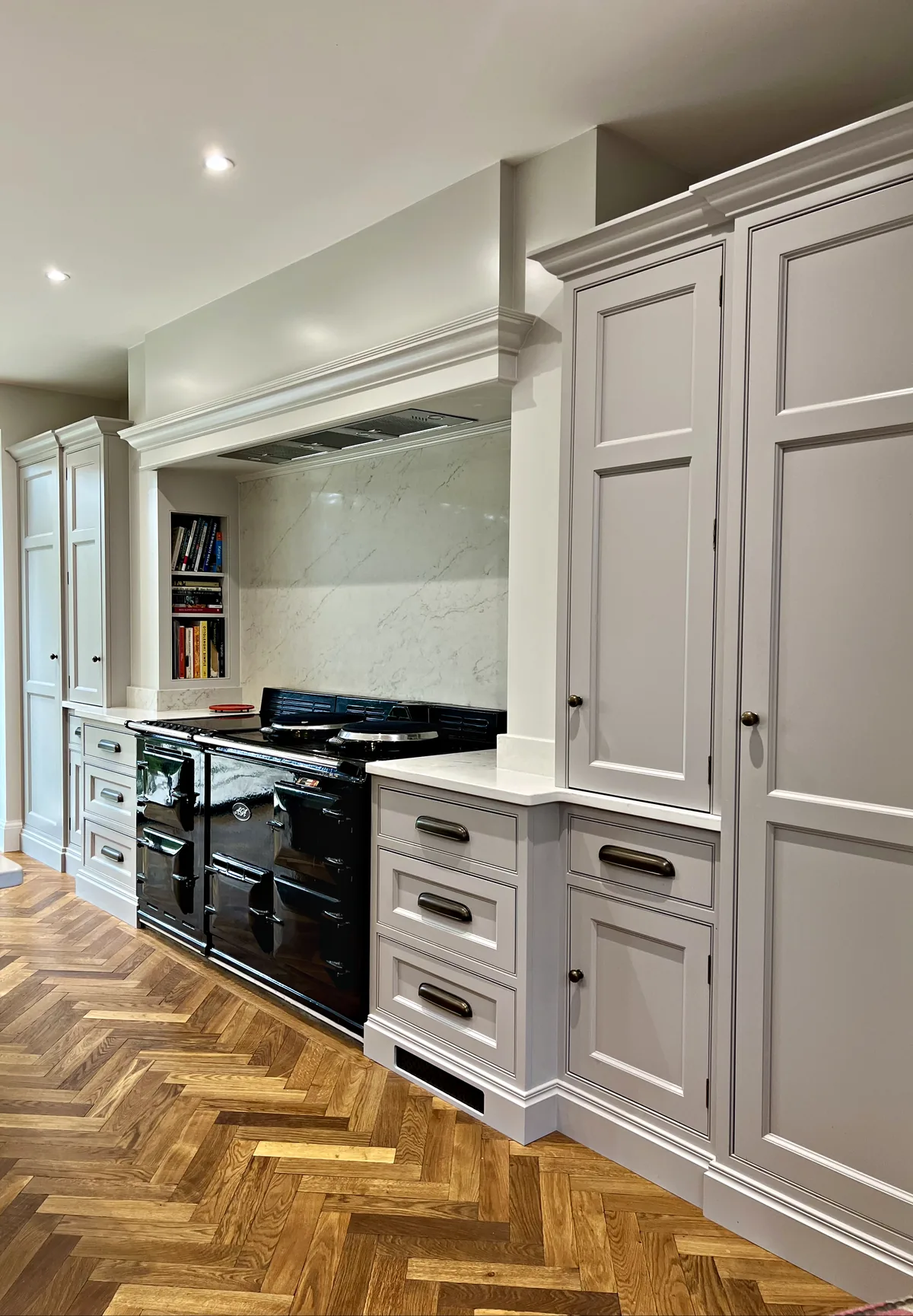 Range cooker and tall cupboards in Pebble Grey