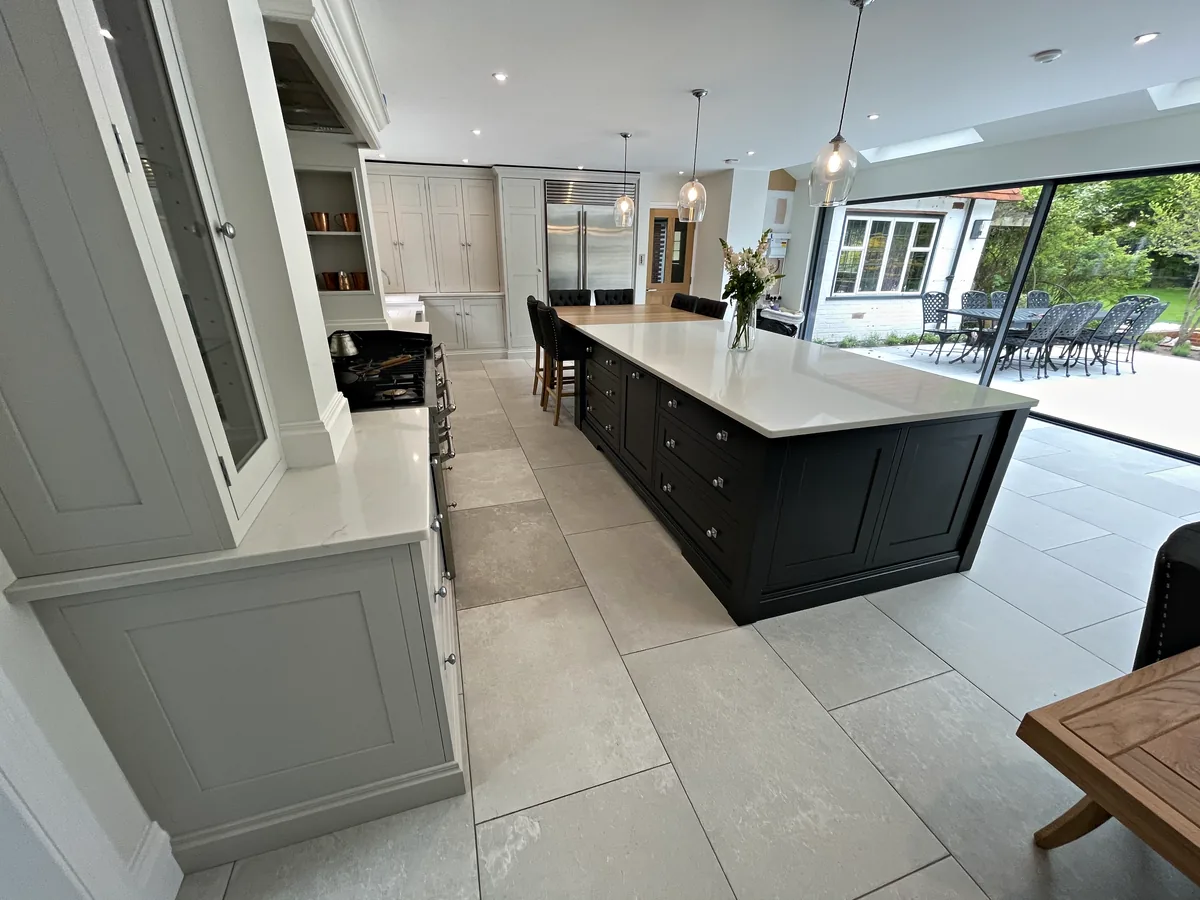 Long Off Black island running from the glazed dresser towards the garden doors